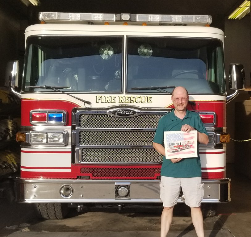 Artist Harrie Vonk with his drawing, standing in front of 8-66