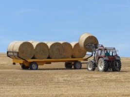 Photo Credit: Loading roundbales, by Maurice Metzger/stock.adobe.com.