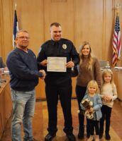 Chase Smith, pictured with Boone Mayor John Slight, his wife Jenna and two of their three daughters.