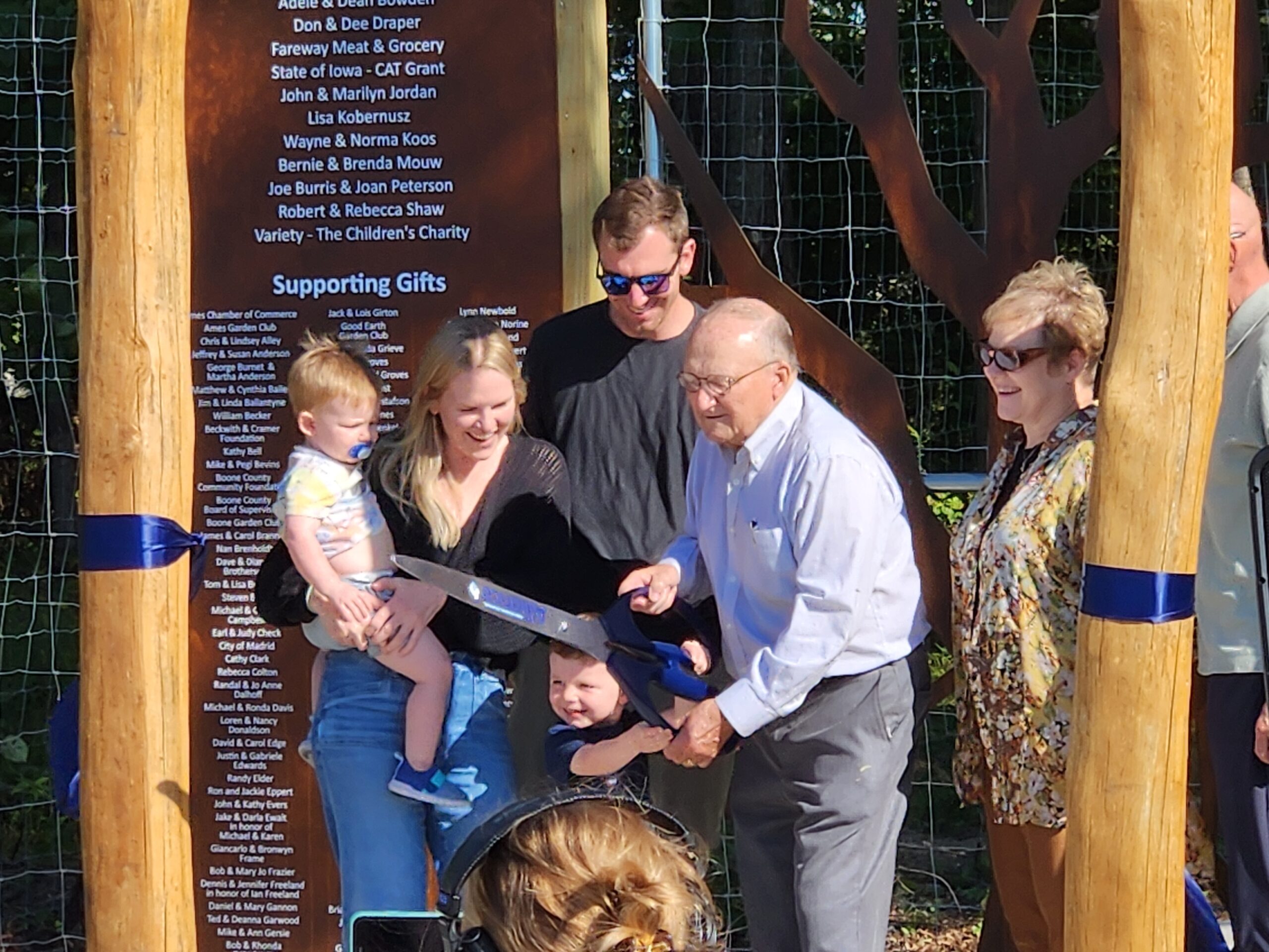 Dean Bowden and family cut the ribbon