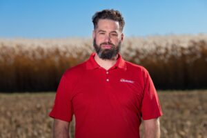 Andrew VanLoocke at the Sustainable Advanced Bioeconomy Research (SABR) farm. (Christopher Gannon/Iowa State University)